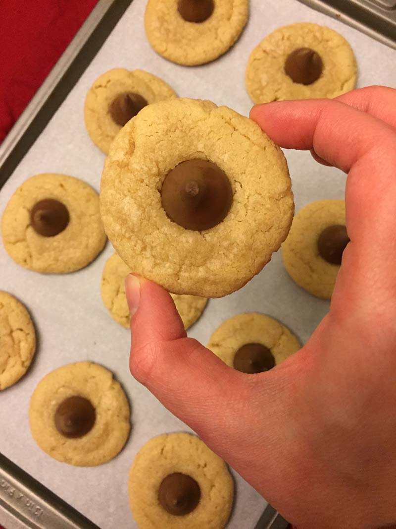 These peanut butter blossoms cookies with Hershey\'s kisses are amazing! So easy to make and always turn out perfect! Peanut butter and milk chocolate - that\'s my kind of a combo!