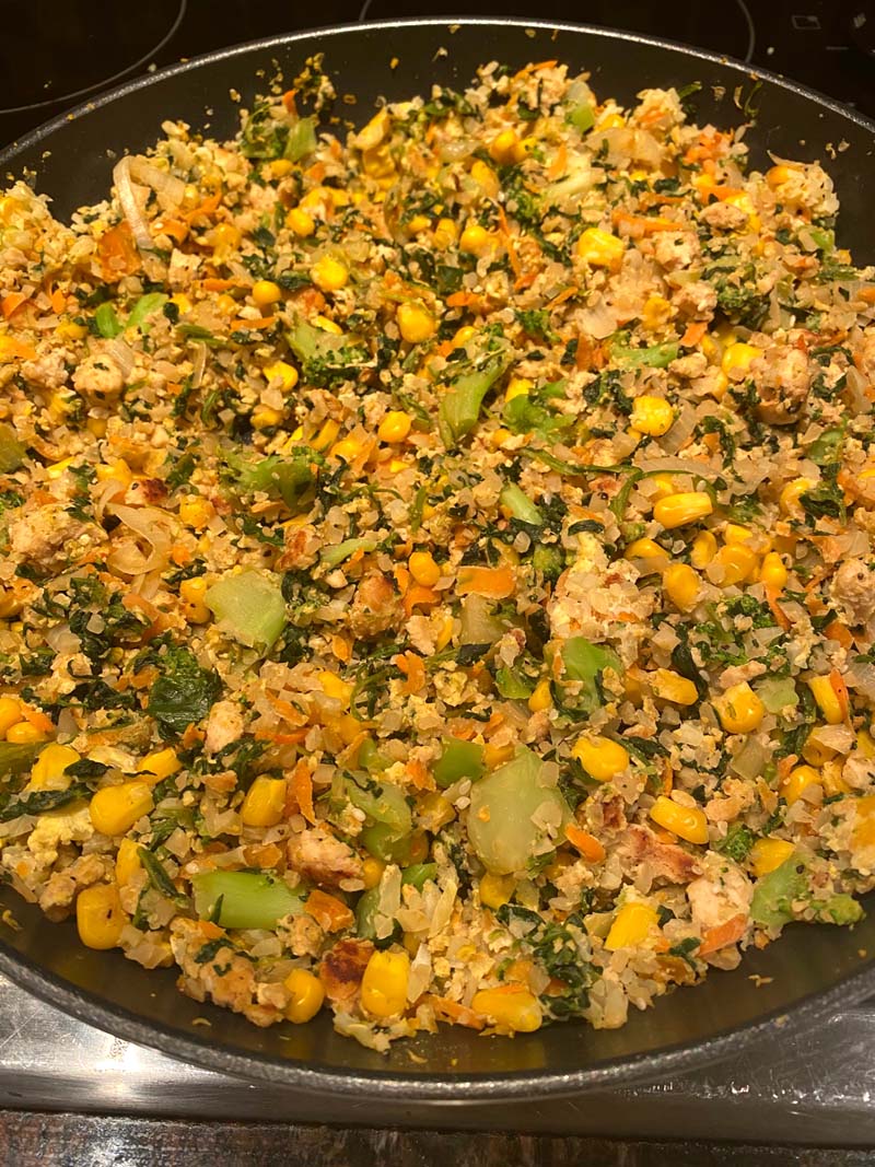 This turkey cauliflower fried rice is amazing! All you need is ground turkey, frozen cauliflower rice, frozen vegetables and egg! So healthy and delicious and ready in 15 minutes!