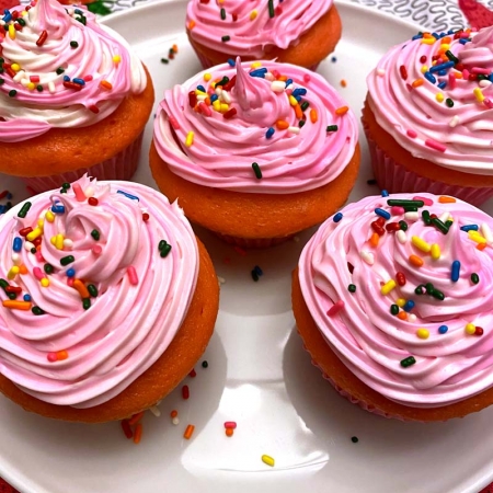 Pink cupcakes with sprinkles