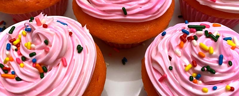 Pink cupcakes with sprinkles