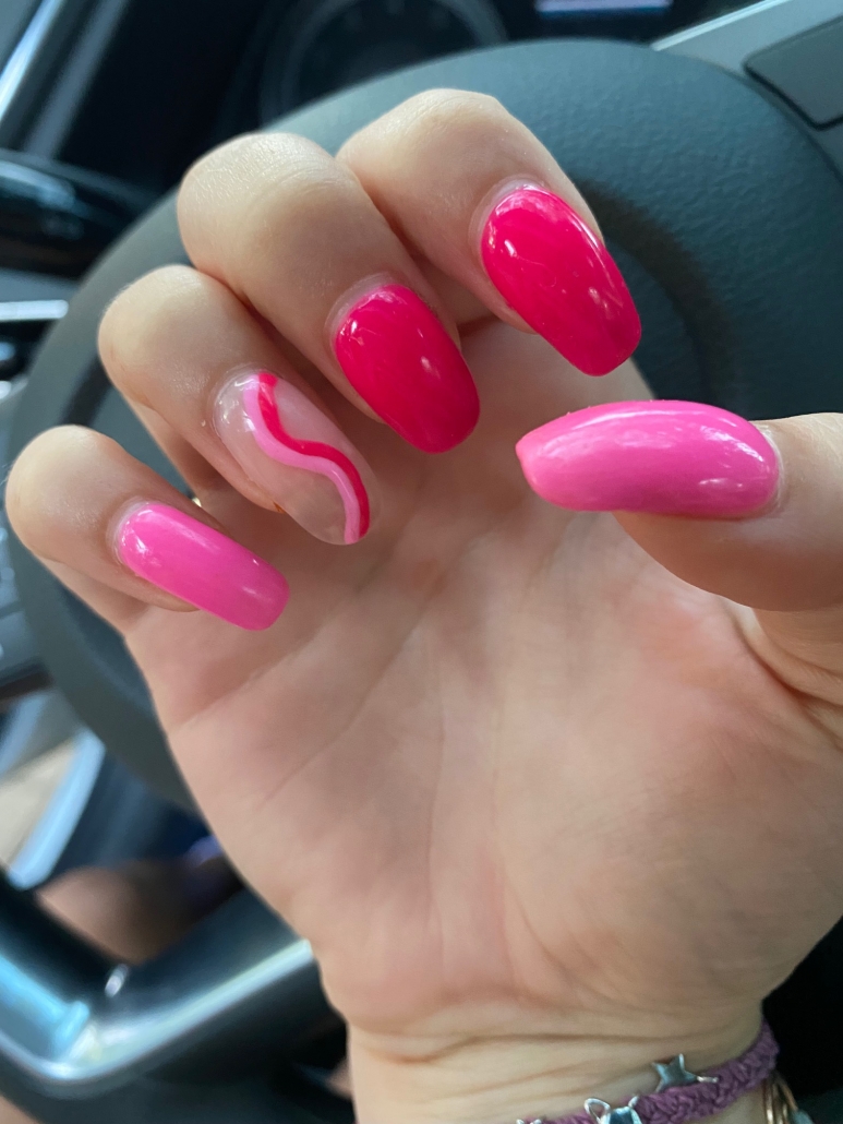 Different Shades Of Pink Nails With Ring Finger Swirl Design