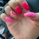 Different Shades Of Pink Nails With Ring Finger Swirl Design