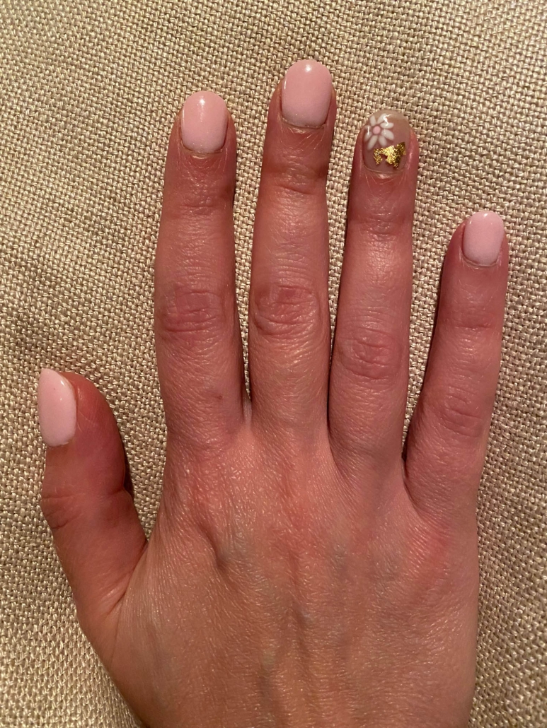 Light Pink Nails Ring Finger Design Idea With Flowers And Gold Foil