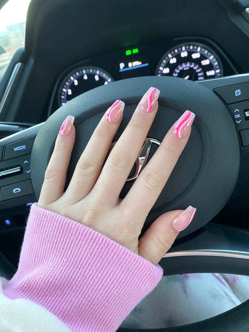 pink swirls nails