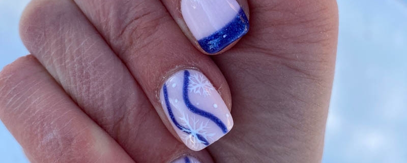 winter snowflake nail designs with blue french nail tips