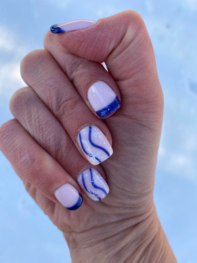 Winter Snowflake Nail Design With Blue French Tips