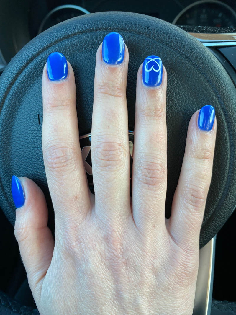 Cobalt Blue Nails With Heart Design On Ring Finger Vibrant Guide