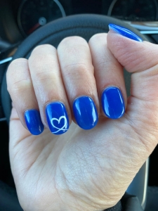 Cobalt Blue Nails With Heart Design On Ring Finger