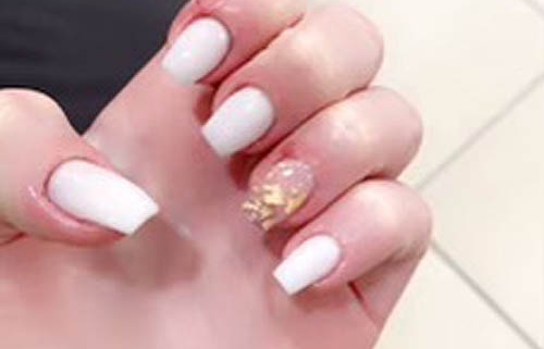 White Nails With Gold Foil Accent Finger