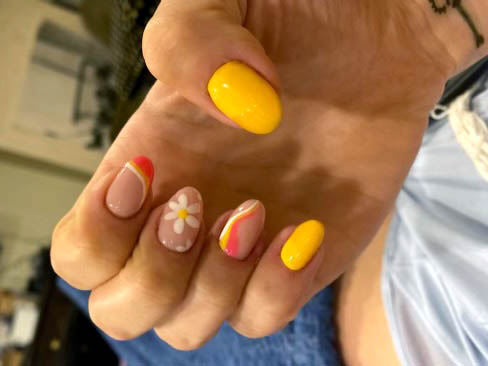 Cute Yellow And Orange Nails Designs With Flowers And Summer Swirls