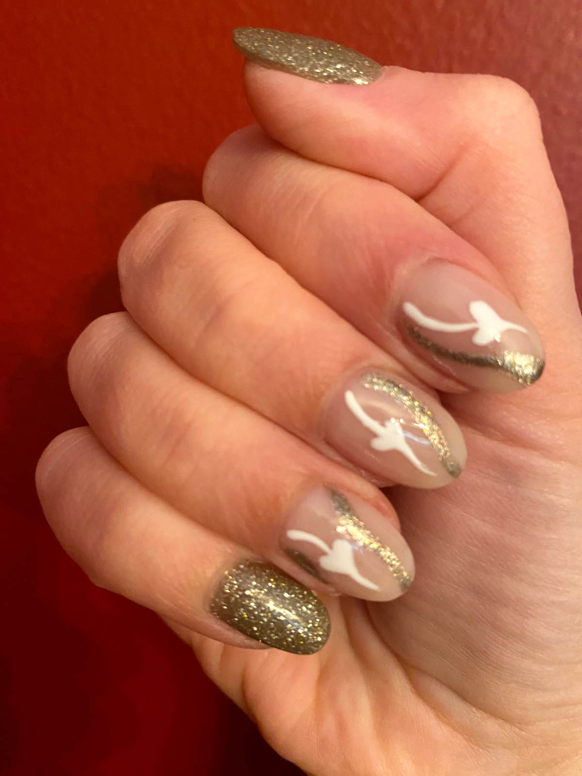 gold and white new year's nails inspo