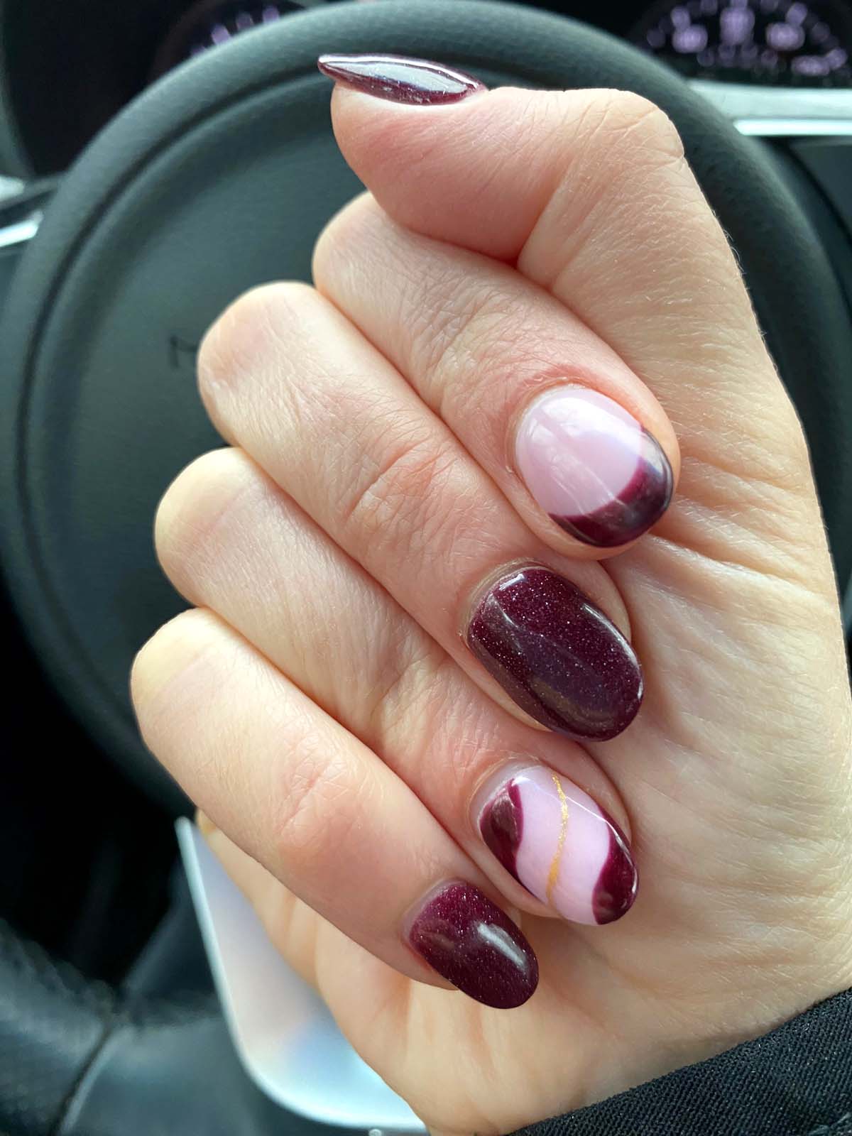 dark red nails with gold