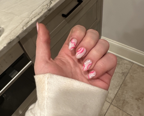 Pink and White Swirls Nail Design
