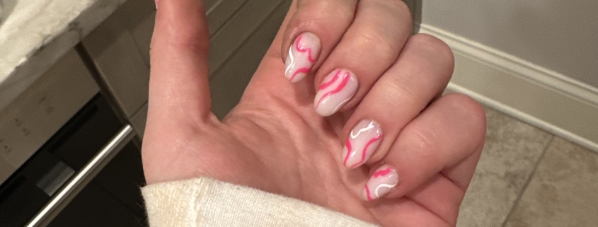 Pink and White Swirls Nail Design