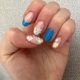 Blue summer nails with flowers