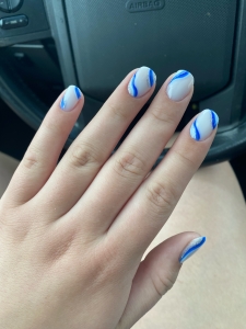 Short White Nails with Blue and Silver Swirls