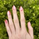Red swirls nails