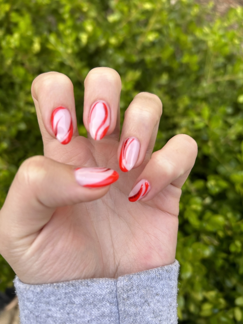 Red swirls nail idea