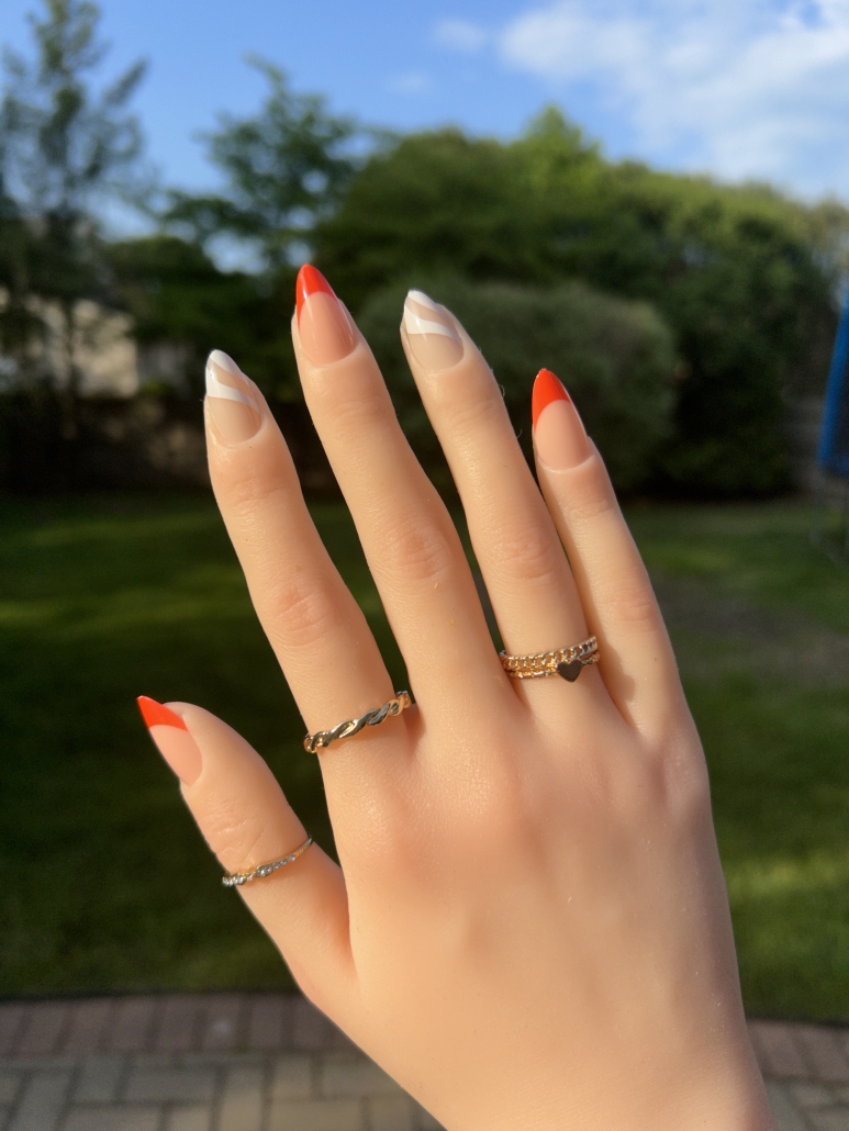 Orange and white nails