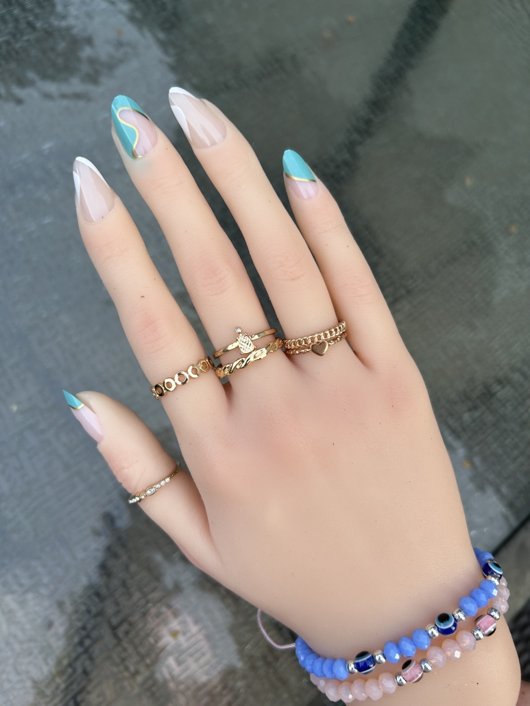 Cute teal gold nails